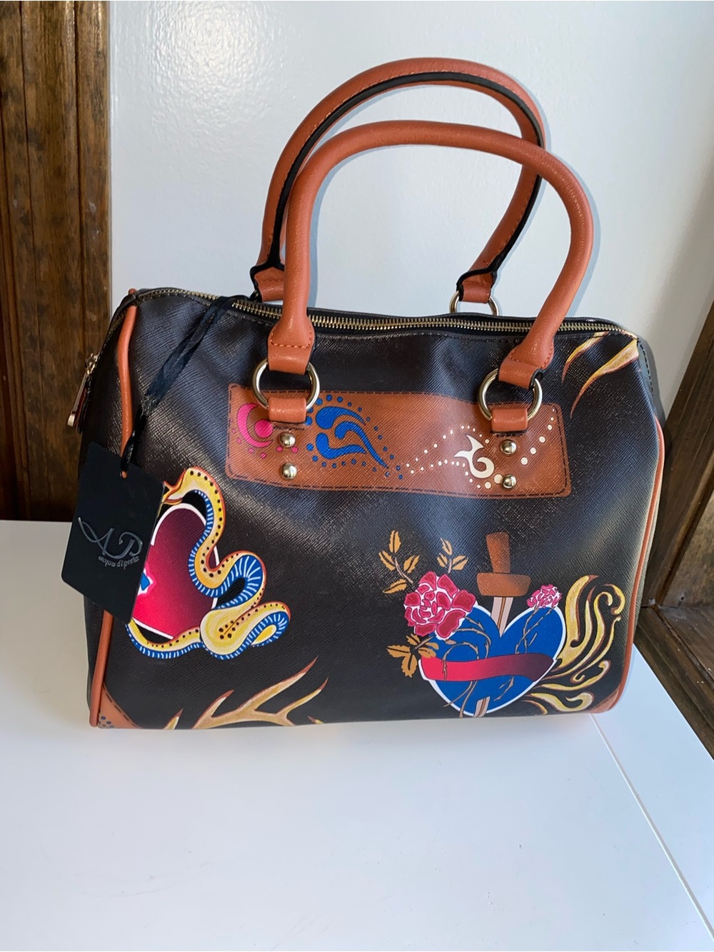 Made in Italy NWT fabulous brown satchel with heart & dagger design